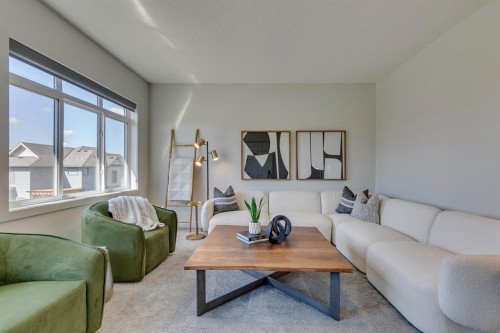 69 Shawnee Green Sw, Calgary, AB - Indoor Photo Showing Living Room