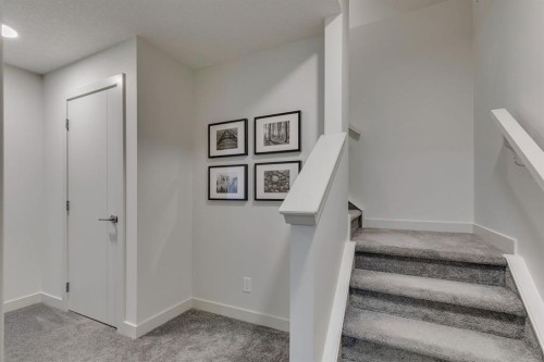 69 Shawnee Green Sw, Calgary, AB - Indoor Photo Showing Other Room