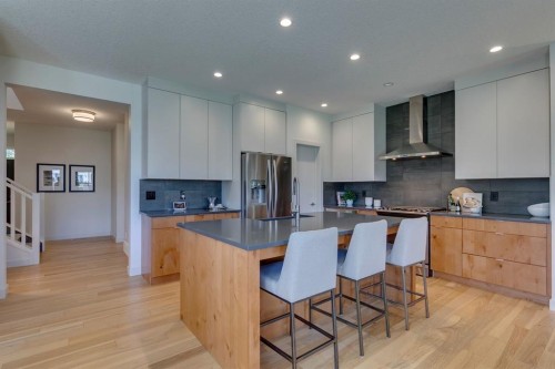 69 Shawnee Green Sw, Calgary, AB - Indoor Photo Showing Kitchen With Stainless Steel Kitchen With Upgraded Kitchen