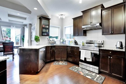 16 Silverado Skies Lane Sw, Calgary, AB - Indoor Photo Showing Kitchen