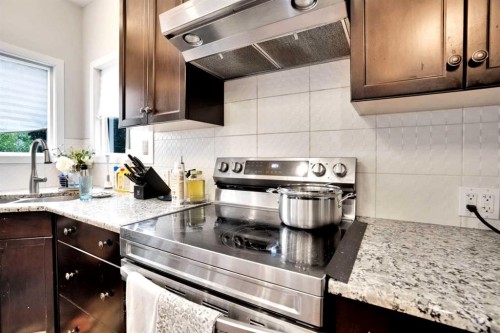 16 Silverado Skies Lane Sw, Calgary, AB - Indoor Photo Showing Kitchen With Upgraded Kitchen