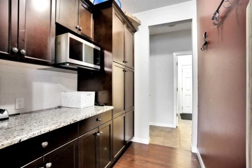 16 Silverado Skies Lane Sw, Calgary, AB - Indoor Photo Showing Kitchen