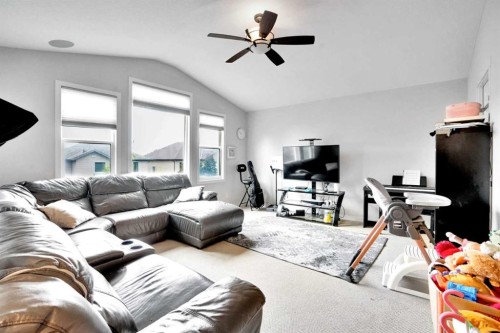 16 Silverado Skies Lane Sw, Calgary, AB - Indoor Photo Showing Living Room