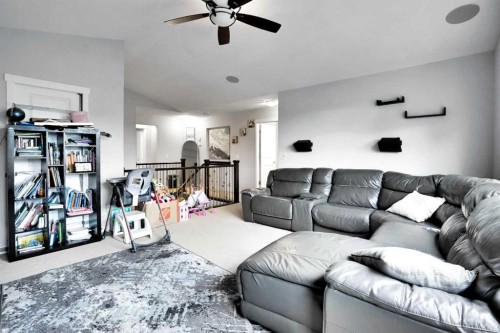 16 Silverado Skies Lane Sw, Calgary, AB - Indoor Photo Showing Living Room