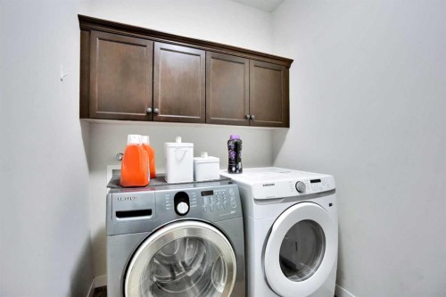 16 Silverado Skies Lane Sw, Calgary, AB - Indoor Photo Showing Laundry Room