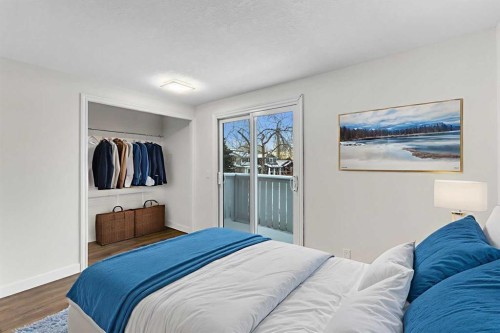 4 Mckernan Place Se, Calgary, AB - Indoor Photo Showing Bedroom