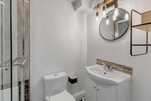 4 Mckernan Place Se, Calgary, AB - Indoor Photo Showing Bathroom