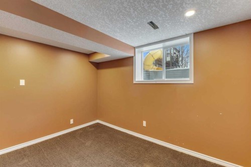 4 Mckernan Place Se, Calgary, AB - Indoor Photo Showing Other Room