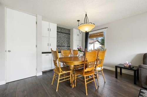 63 Olympia Crescent Se, Calgary, AB - Indoor Photo Showing Dining Room