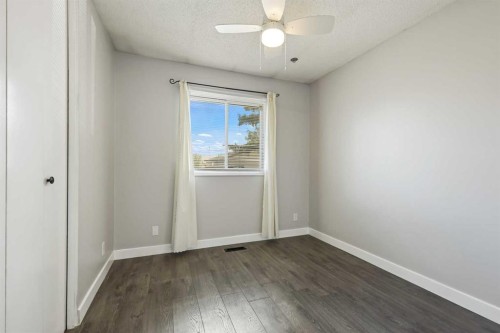 63 Olympia Crescent Se, Calgary, AB - Indoor Photo Showing Other Room