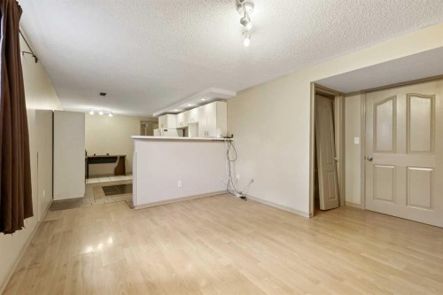 63 Olympia Crescent Se, Calgary, AB - Indoor Photo Showing Other Room