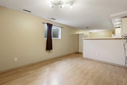 63 Olympia Crescent Se, Calgary, AB - Indoor Photo Showing Other Room