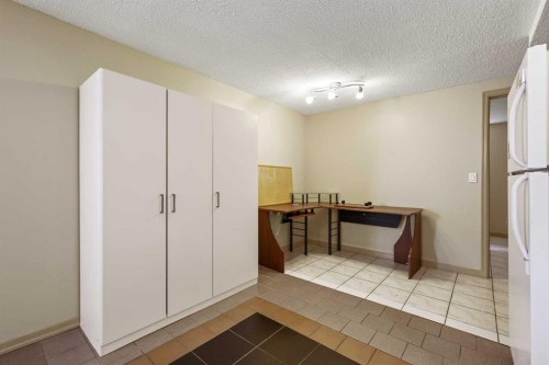 63 Olympia Crescent Se, Calgary, AB - Indoor Photo Showing Other Room