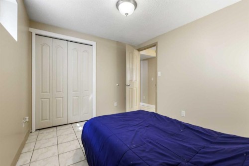 63 Olympia Crescent Se, Calgary, AB - Indoor Photo Showing Bedroom