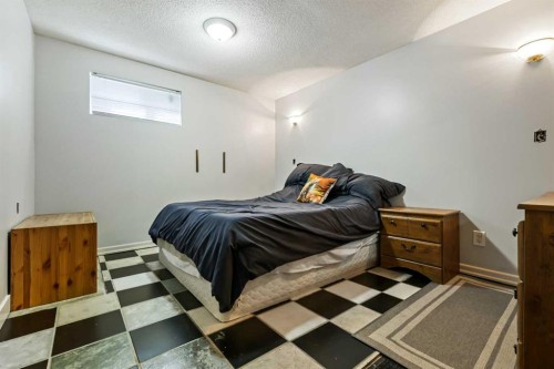 63 Olympia Crescent Se, Calgary, AB - Indoor Photo Showing Bedroom