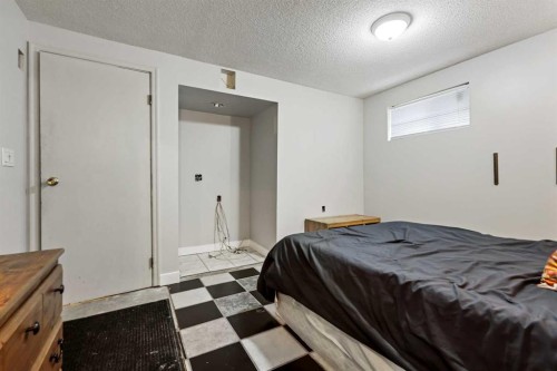 63 Olympia Crescent Se, Calgary, AB - Indoor Photo Showing Bedroom