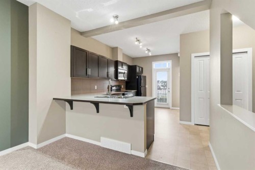 172 New Brighton Point Se, Calgary, AB - Indoor Photo Showing Kitchen