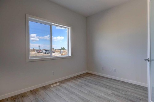 98 Silver Spruce Road Sw, Calgary, AB - Indoor Photo Showing Other Room