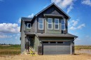 98 Silver Spruce Road Sw, Calgary, AB  - Outdoor With Facade 