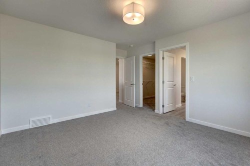 98 Silver Spruce Road Sw, Calgary, AB - Indoor Photo Showing Other Room