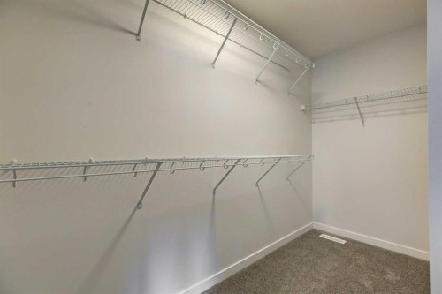 98 Silver Spruce Road Sw, Calgary, AB - Indoor With Storage