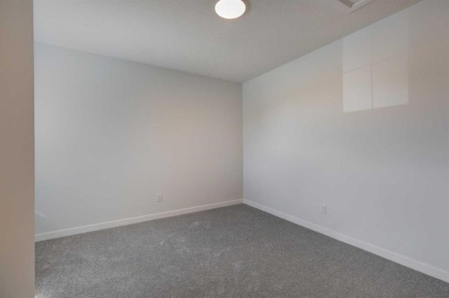 98 Silver Spruce Road Sw, Calgary, AB - Indoor Photo Showing Other Room