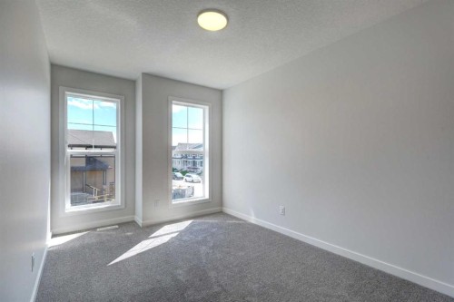 98 Silver Spruce Road Sw, Calgary, AB - Indoor Photo Showing Other Room