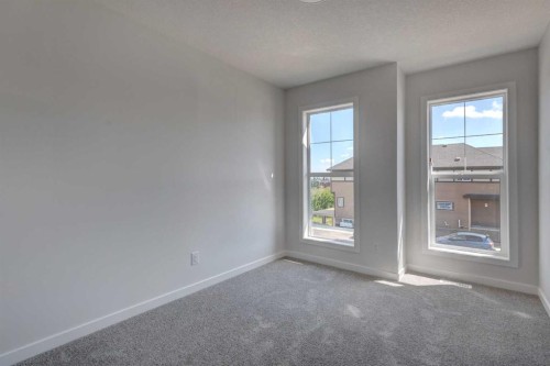 98 Silver Spruce Road Sw, Calgary, AB - Indoor Photo Showing Other Room