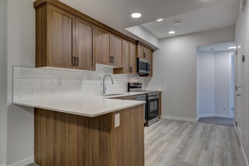 98 Silver Spruce Road Sw, Calgary, AB - Indoor Photo Showing Kitchen
