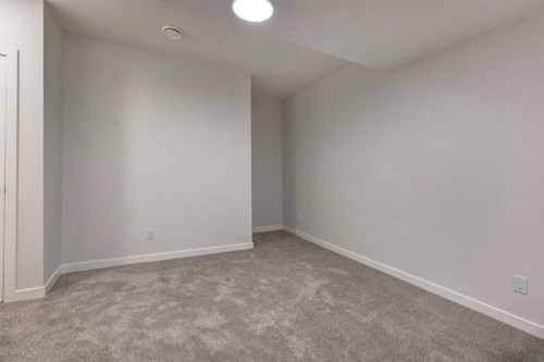 98 Silver Spruce Road Sw, Calgary, AB - Indoor Photo Showing Other Room