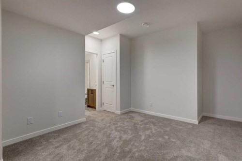 98 Silver Spruce Road Sw, Calgary, AB - Indoor Photo Showing Other Room