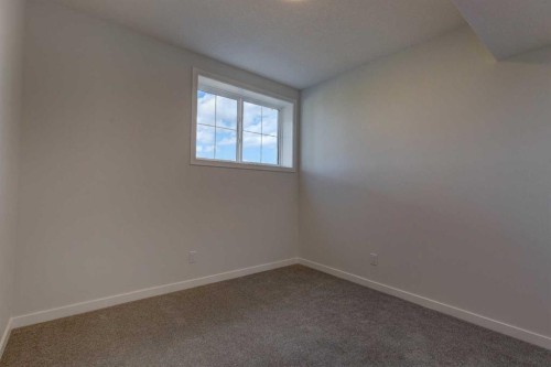 98 Silver Spruce Road Sw, Calgary, AB - Indoor Photo Showing Other Room