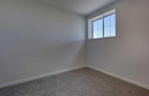98 Silver Spruce Road Sw, Calgary, AB - Indoor Photo Showing Other Room