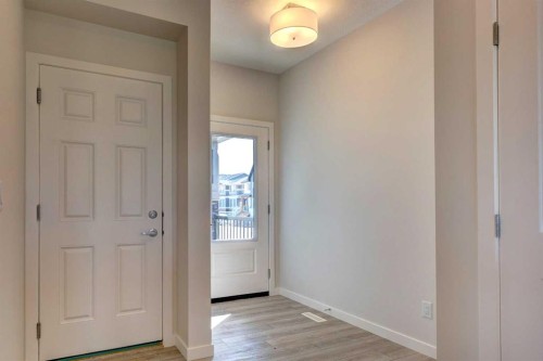 98 Silver Spruce Road Sw, Calgary, AB - Indoor Photo Showing Other Room