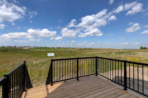98 Silver Spruce Road Sw, Calgary, AB - Outdoor With Deck Patio Veranda With View