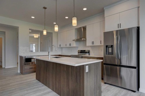 98 Silver Spruce Road Sw, Calgary, AB - Indoor Photo Showing Kitchen With Upgraded Kitchen