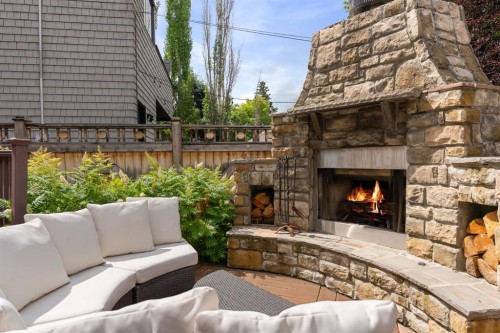 3025 Elbow Drive Sw, Calgary, AB -  Photo Showing Living Room With Fireplace