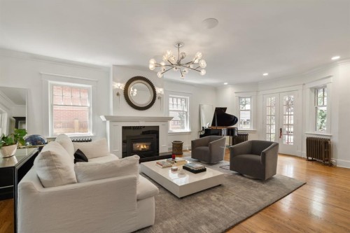 3025 Elbow Drive Sw, Calgary, AB - Indoor Photo Showing Living Room With Fireplace