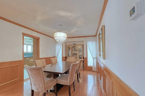 115 Strathaven Circle Sw, Calgary, AB - Indoor Photo Showing Dining Room