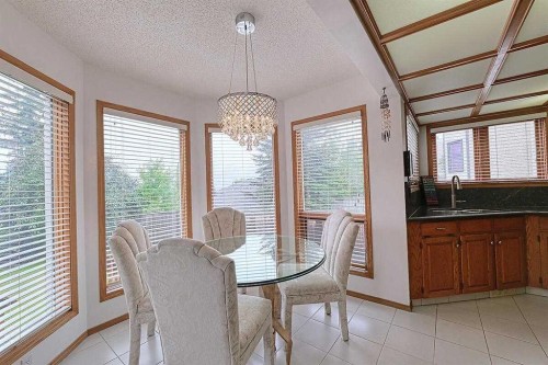 115 Strathaven Circle Sw, Calgary, AB - Indoor Photo Showing Dining Room