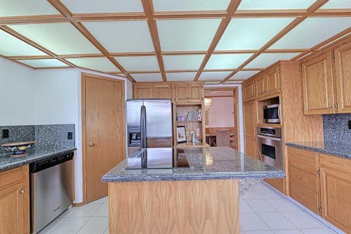 115 Strathaven Circle Sw, Calgary, AB - Indoor Photo Showing Kitchen With Stainless Steel Kitchen