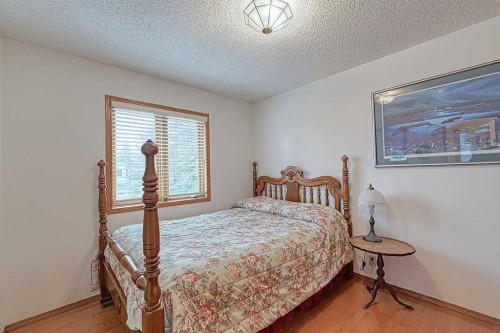 115 Strathaven Circle Sw, Calgary, AB - Indoor Photo Showing Bedroom
