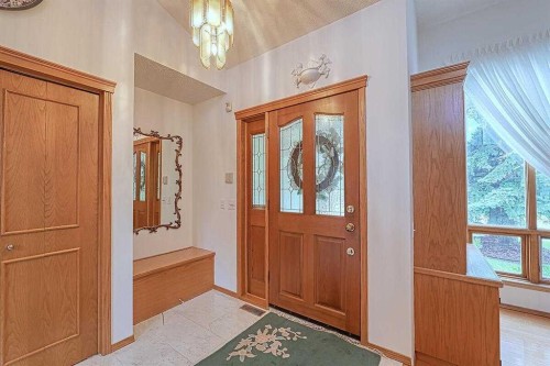 115 Strathaven Circle Sw, Calgary, AB - Indoor Photo Showing Other Room