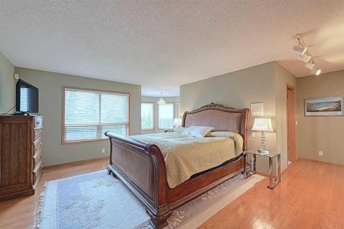 115 Strathaven Circle Sw, Calgary, AB - Indoor Photo Showing Bedroom