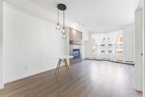 302-2420 34 Avenue Sw, Calgary, AB - Indoor With Fireplace