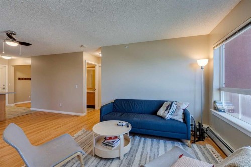 329-22 Richard Place Sw, Calgary, AB - Indoor Photo Showing Living Room