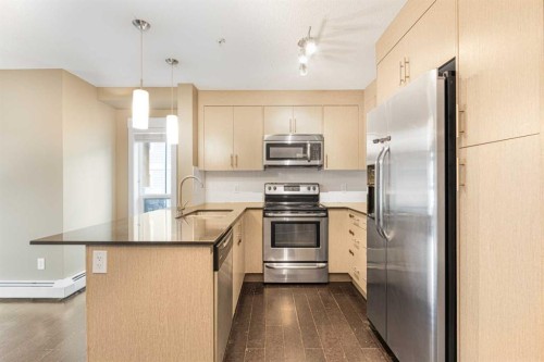 3315-240 Skyview Ranch Road Ne, Calgary, AB - Indoor Photo Showing Kitchen With Stainless Steel Kitchen With Upgraded Kitchen