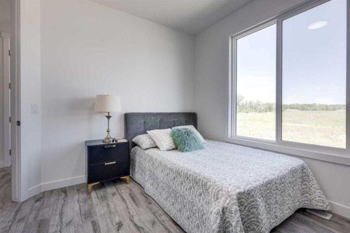 4240 Bauman Way, Innisfail, AB - Indoor Photo Showing Bedroom
