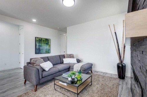 4240 Bauman Way, Innisfail, AB - Indoor Photo Showing Living Room