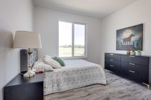 4240 Bauman Way, Innisfail, AB - Indoor Photo Showing Bedroom